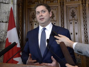 Conservative Leader Andrew Scheer, shown here putside the Canadian House of Commons, has been meeting with British politicians in the United Kingdom this week.
