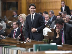 Prime Minister Justin Trudeau's government is getting flak from readers over the ban on certain gender-specific words. (Justin Tang/The Canadian Press)