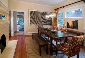 Colour and texture complement a photograph of a zebra to establish a sense of exoticism in this dining room. (STEPHEN YOUNG, Laura Casey Interiors)