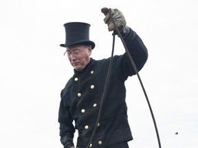 Master chimney sweep Norbert Skrobek demonstrates his trade. (Getty Images)