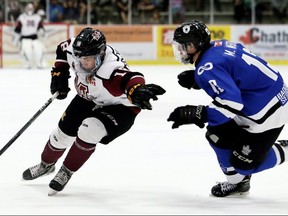 Chatham Maroons' Josh Supryka (18) is chased by London Nationals' Mitchell Webb (13) in the second period at Chatham Memorial Arena in Chatham. (Mark Malone/Postmedia Network file photo)