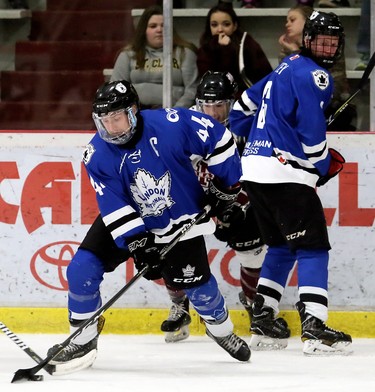 London Nationals' Brenden Trottier (44) wins a battle for the puck along the boards against the Chatham Maroons in the first period of Game 3 in their GOJHL Western Conference semifinal at Chatham Memorial Arena in Chatham, Ont., on Sunday, March 18, 2018. Mark Malone/Postmedia Network