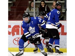 London Nationals' Brenden Trottier (44) wins a battle for the puck along the boards against the Chatham Maroons in the first period of Game 3 in their GOJHL Western Conference semifinal. (Mark Malone/Postmedia Network)