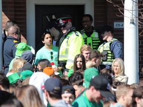 London police were busy clearing out house parties, including this one on Central Avenue, on St. Patrick's Day in 2018. (Free Press file photo)