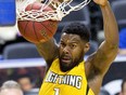 London Lightning player Kyle Johnson slams home two points against the Niagara River Lions  during their NBL game at Budweiser Gardens in London, Ont. on Saturday December 23, 2017.  DEREK RUTTAN, The London Free Press