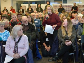 Helen Riordon asks a question during a public input session with city officials concerning the proposals for Bus Rapid Transit  at the Central Library on Wednesday January 24, 2018 (MORRIS LAMONT, The London Free Press)
