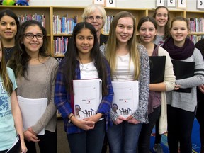 Amber Pridoehl, 13,  Janan Dean, Venus Osmani, 13, Eman Tanveer, 13, Peggy Sattler MPP, Sara Enns, 13, Adria Gioiosa, 13, Olivia Floris, 13, Kennedi Knoch, 13, and Mary Chamberlain Girls in government in London, Ont. (MIKE HENSEN, The London Free Press)