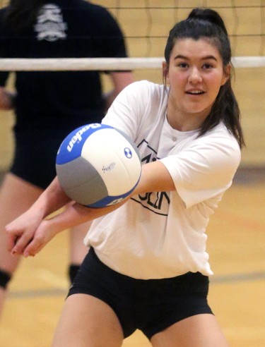 Natalie Lyons, a co-captain of the Oakridge girls volleyball team warms up at practice in London, Ont.  They will be the second seed at the OFSAA tournament they host, starting Monday morning. Photograph taken on Thursday March 1, 2018.  Mike Hensen/The London Free Press/Postmedia Network