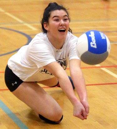 Natalie Lyons, a co-captain of the Oakridge girls volleyball team warms up at practice in London, Ont.  They will be the second seed at the OFSAA tournament they host, starting Monday morning. Photograph taken on Thursday March 1, 2018.  Mike Hensen/The London Free Press/Postmedia Network