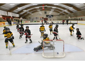 A goal is scored during a game of initiation level hockey at Oakridge area on Sunday March 4, 2018. The ice is divided into two or three pads to allow everyone to be engaged in the play. (MORRIS LAMONT, The London Free Press)