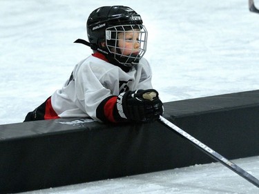 A player waits on the ice for his turn to get back into the action during a game of initiation level hockey at Oakridge arena.  MORRIS LAMONT/THE LONDON FREE PRESS /POSTMEDIA NETWORK