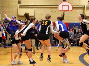 From left to right, Thea Brouwer Brooke Richards, Hannah Petcoff, Maggie McKee, Jensen Tait (hidden) and Natalie Lyons react as the Oakridge Oaks win the gold medal in OFSAA AAA over St. Marcellinus. Oakridge dropped the first set 22-25, but roared with sets of 25-14, 25-16, and 25-13 to the 3-1 win and the gold medal.