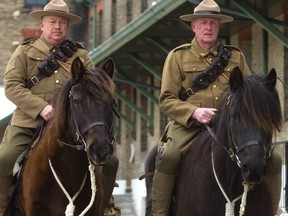 Steve Hartwick and Andy Thompson (l-r) are two members of the 1st Hussars Calvary Troop who will be participating in a remembrance ride in France this September, following the route the First Hussars took in 1918 at the end of the First World War. They were at Wolseley Barracks on Sunday March 11, 2018 on two Canadian horses, Sam and Ted.  Mike Hensen/The London Free Press)