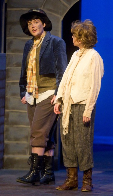 Connor Englert as the Artful Dodger sings Consider Yourself with Oliver, played by Hope Wilson, at the Palace Theatre in London Tuesday. Mike Hensen/The London Free Press