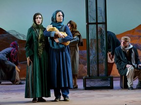 Mirian Katrib, left, plays Laila and Deena Aziz is Mariam in the Grand Theatre production of A Thousand Splendid Suns. (MORRIS LAMONT, The London Free Press)