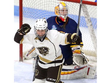 Courtlyn Oswald of the Manitoba Bisons celebrates a goal in front of Queen's Gaels goaltender Stephanie Pascal in a U Sports women's championship quarterfinal Friday at Thompson arena. 
Mike Hensen/The London Free Press