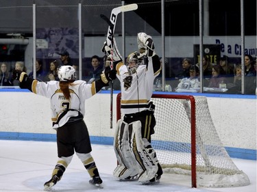 Manitoba Bisons goaltender Lauren Taraschuk and defenceman Caitlin Fyten celebrate after winning the Women's Hockey National Championship 2-0 over Western at Western University's Thompson Arena on Sunday March 18, 2018. MORRIS LAMONT/THE LONDON FREE PRESS /POSTMEDIA NETWORK