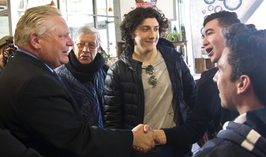 Doug Ford stopped at the Covent Garden Market on Monday to shake hands with Londoners as part of his campaign swing through southwestern Ontario on Monday March 26, 2018.  Mike Hensen/The London Free Press/Postmedia Network