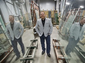 Provincial Glass and Mirror Ltd. president Brett Lucier on the shop floor of the company's new location at 229 Horton St. in London. (DEREK RUTTAN, The London Free Press)