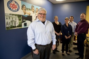 Global Dispatch Solutions CEO Anthony Royer with employees of Dominion Automobile Association, Lieete Gerth, Holl Macgowan, Wayne Abadie and Steve Jones in London. (DEREK RUTTAN, The London Free Press)