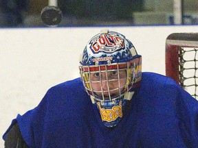 London Nationals goalie David Ovsjannikov keeps his focus on a flying puck during practice at the Western Fair Sports Centre in London on Tuesday. The Nationals open the GOJHL Western Conference final against the St. Thomas Stars at Western Fair on Wednesday night. (DEREK RUTTAN, The London Free Press)