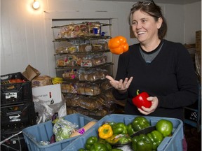 Jane Roy, the co-executive director of the London Food Bank, says it's great that they are getting more fresh produce from local grocery stores, including some bright bell peppers from the Gammage Street Superstore on Friday. Roy says they receive about 1,200 to 1,500 pounds of fresh produce every week, and that number is increasing. Roy singled out the Gammage Superstore location as having great managerial support for the food bank. (MIKE HENSEN, The London Free Press)