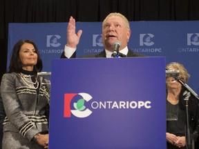 Doug Ford recalls the name of his brother Rob Ford as he stands at the podium after being named as the newly elected leader of the Ontario Progressive Conservatives. (The Canadian Press)