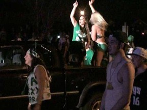 Hundreds of people riot on Fleming Drive after a 2012 St. Patrick's Day party near Fanshawe College. (File photo)