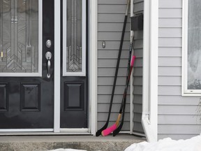 Hockey stick sits on the front porch of a house in Humboldt, Sask. (File photo)