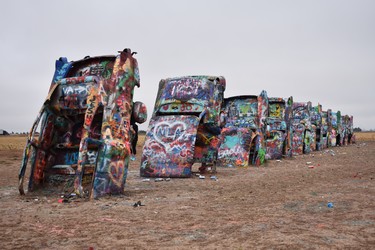 Ten paint-layered half-buried Cadillacs have been a roadside attraction outside Amarillo, Texas for more than four decades. Visitors to Cadillac Ranch are invited to spray away but also advised their work will likely be overtaken by other artsy visitors within weeks.

BARBARA TAYLOR/The London Free Press/Postmedia News