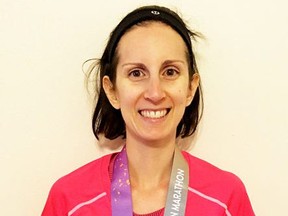 Sarnia's Kathryn Smith poses after completing the Houston Marathon earlier this year. The 27-year-old is preparing for a 335-kilometre trek through Namibia in May and is raising money to support Noelle's Gift. (Handout)