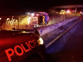 A collision between a minivan and a tractor trailer loaded with propane closed Highway 402 east of Longwoods Road and sent one person to hospital with serious injuries. (Courtesy OPP)