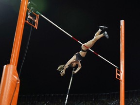 Canadas Alysha Newman competes in the athletics women's pole vault final during the 2018 Gold Coast Commonwealth Games at the Carrara Stadium on the Gold Coast on April 13, 2018. (AFP PHOTO)