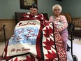 Arthur Lee, 94, and his wife Peggy Lee, 92, celebrated their 68th wedding anniversary on Saturday, at a joint celebration where Arthur Lee, a Second World War veteran, was presented with a quilt of valour. It was the 10,848th quilt presented by a Canadian non-profit organization that makes quilts for injured servicemen and women and veterans.  (MEGAN STACEY, The London Free Press)