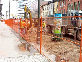 Work began a week ago on turning Dundas Street into a flex street. Core businesses say, so far, the are  not suffering a disruption in business because of the construction. (DAN BROWN, The London Free Press)