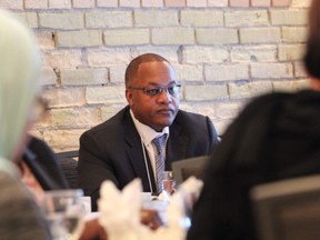 Justice Michael Tulloch listens to a speaker during a public consultation on the police practice of carding at the Delta London Armouries on Wednesday. (DALE CARRUTHERS, The London Free Press)