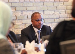 Justice Michael Tulloch listens to a speaker during a public consultation on the police practice of carding at the Delta London Armouries on Wednesday. (DALE CARRUTHERS, The London Free Press)