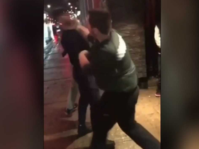 Screengrab from a cellphone video obtained by The Free Press. It shows a bouncer's knockout punch outside Molly Bloom's, a bar on Richmond Row in downtown London.