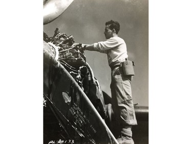 Leading Aircraftman Peter Brennan works on the 435 Squadron's Dakota aircraft during the Second World War.