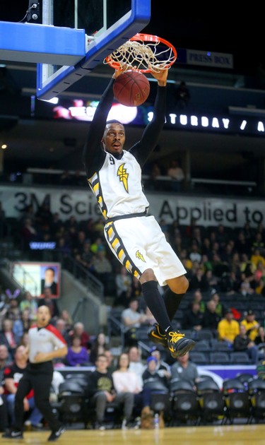 Doug Herring Jr. of the London Lightning gets an easy look for a dunk during the first half against the Island Storm.
Mike Hensen/The London Free Press/