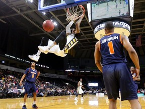 Mo Bolden of the London Lightning celebrates a dunk after missing a prior attempt.
Mike Hensen/The London Free Press