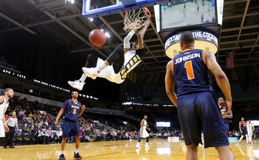 Mo Bolden of the London Lightning celebrates a dunk after missing a prior attempt.
Mike Hensen/The London Free Press