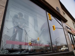 McHardy Vacuum on Dundas St. had one of it's windows broken by a vandal in London. (DEREK RUTTAN, The London Free Press)