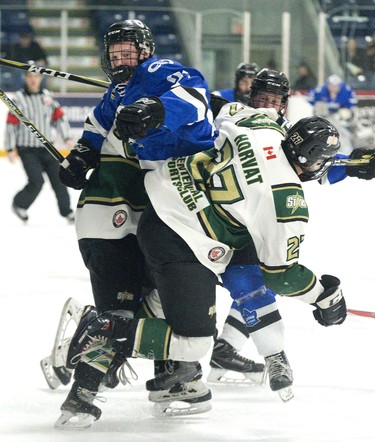 London Nationals forward Colin Wilson is squished between Cal Horvat and Matt Couto of the St. Thomas Stars in the first period of their game at the Timken Centre in St. Thomas. (DEREK RUTTAN, The London Free Press)