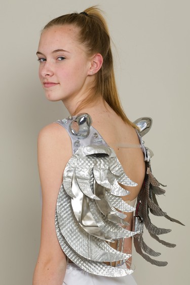Jayne Witchell, 14, of South secondary school, wears a winged creation by Carly Mitchell and Chalyn Neville, students in Fanshawe College's design foundations and fashion marketing and management program. 
Mike Hensen/The London Free Press