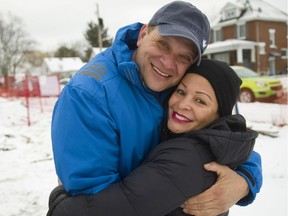 Carlos and Claudia Munoz-Guttierez hug as they arrive at the groundbreaking for their Habitat for Humanity home on Forbes Street in the Manor Park area of London.  Habitat is building two homes on the site, one for the Munoz-Guttierez family and one accessible home for three men with developmental impairments through Christian Horizons. (Mike Hensen/The London Free Press)