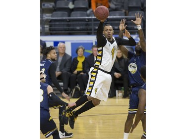 Doug Herring Jr. of the London Lightning makes a pass during Game 1 of the National Basketball League of Canada best-of-seven Central Division final against the St. John's Edge Tuesday at Budweiser Gardens. Derek Ruttan/The London Free Press