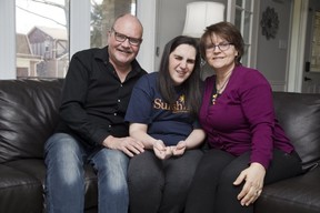 Tom, Katie and Angie Kehoe at their home in London. (DEREK RUTTAN, The London Free Press)