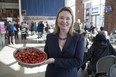 Middlesex London Food Policy Council member Tosha Densky with some of the food being served at the council's annual general meeting at Covent Garden Market in London. (DEREK RUTTAN, The London Free Press)