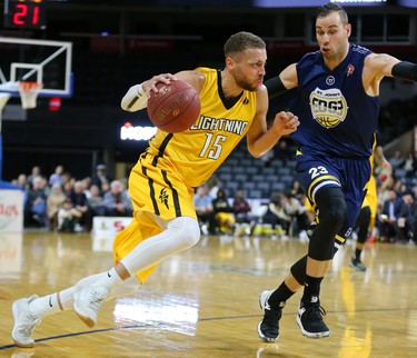 Garrett Williamson of the Lightning drives on Carl English league MVP of the St. John's Edge as the Lightning won 106-101 in a hard fought battle at Budweiser Gardens on Sunday April 29, 2018. Williamson led the team with 25 points mostly on hard slashes to the net along with 10 rebounds and 7 assists. The Lightning won the series 4-2 and will now face Halifax for the NBL championship. Mike Hensen/The London Free Press/Postmedia Network
